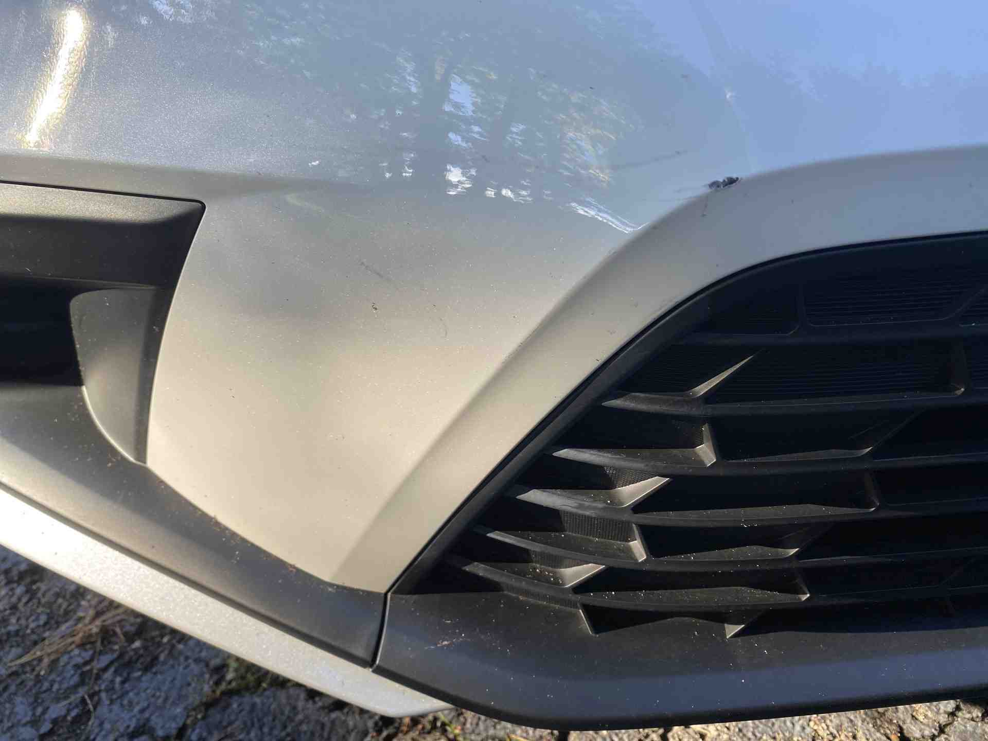 Should I file an insurance claim for a small dent on my car?